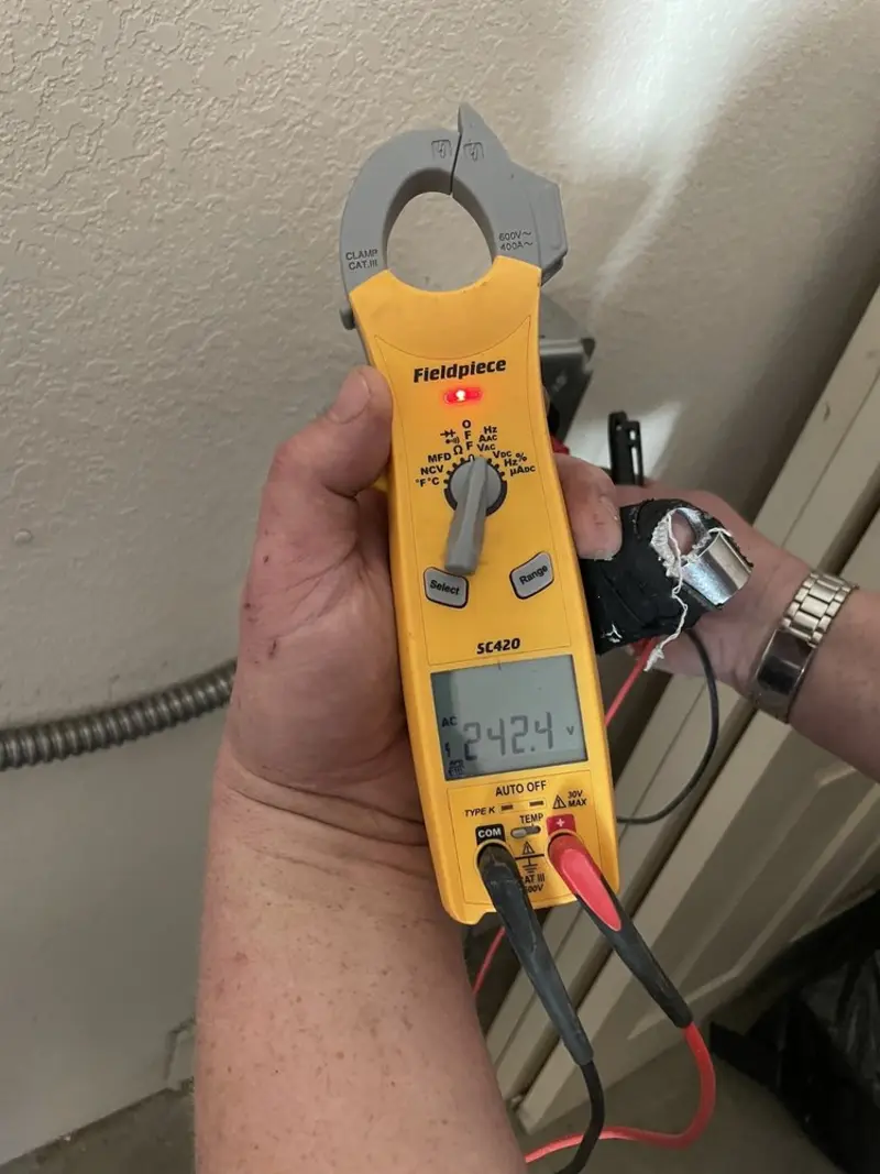 Voltage testing with clamp meter during Ceiling Fan Installation in Sultan